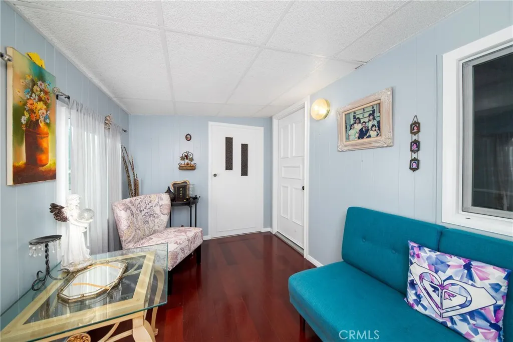 4000 Pierce Street, Unit 58 Riverside, CA 92505 - Photo 9 of 32 a living room with furniture and a window
