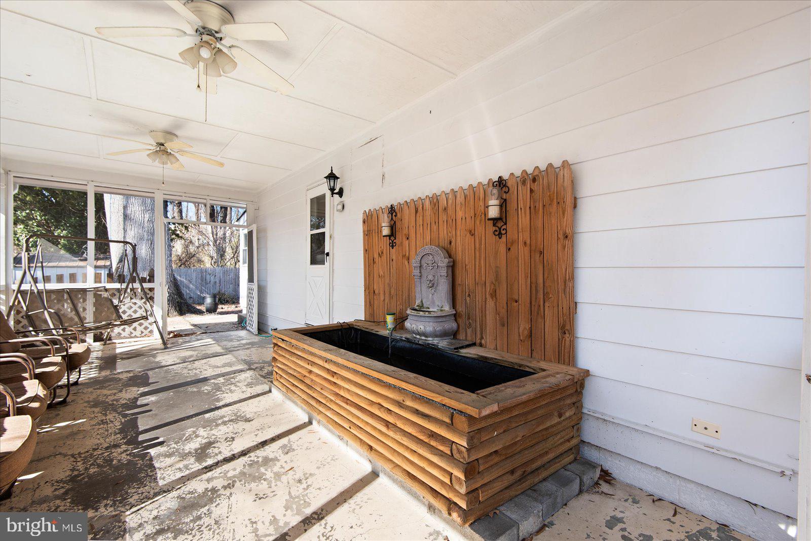 227 7th Street Colonial Beach, VA 22443 - Photo 32 of 36 a view of living room and window