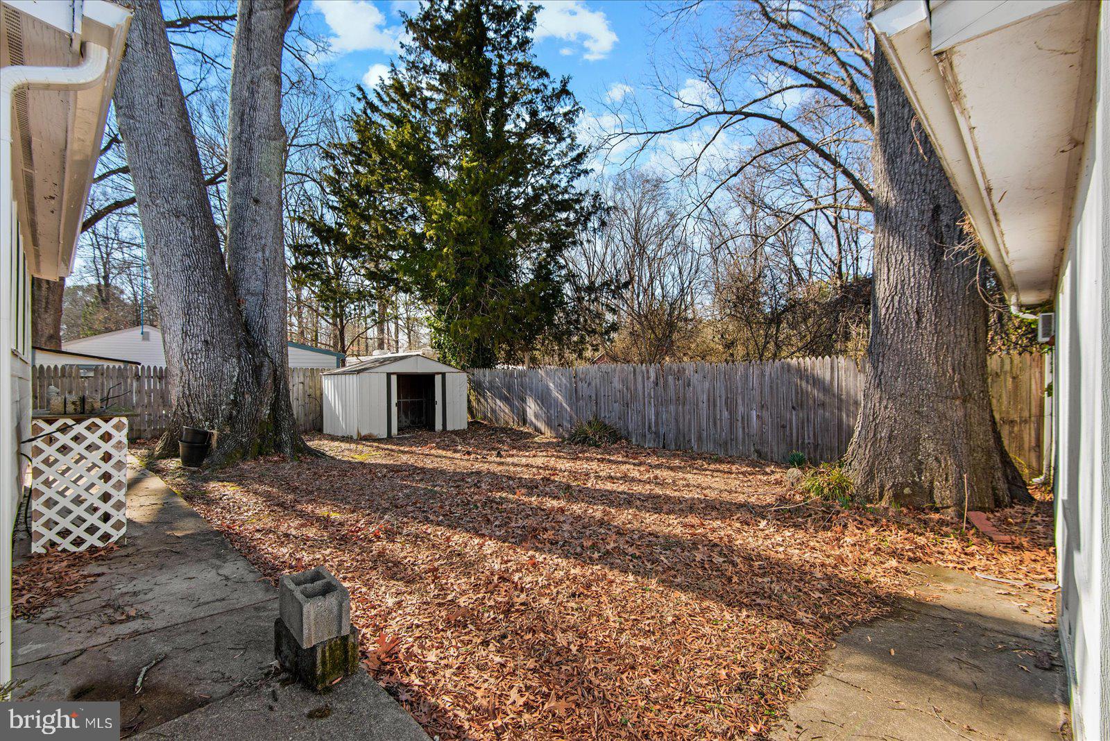 227 7th Street Colonial Beach, VA 22443 - Photo 34 of 36 a view of a backyard of the house