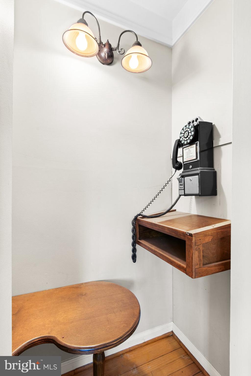 227 7th Street Colonial Beach, VA 22443 - Photo 9 of 36 a bathroom with a sink and mirror