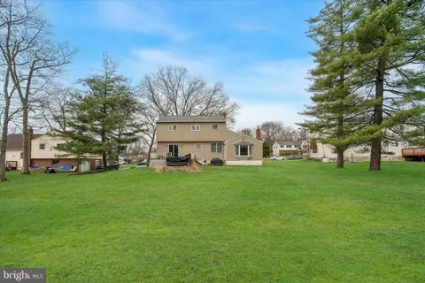 a view of a house with a big yard