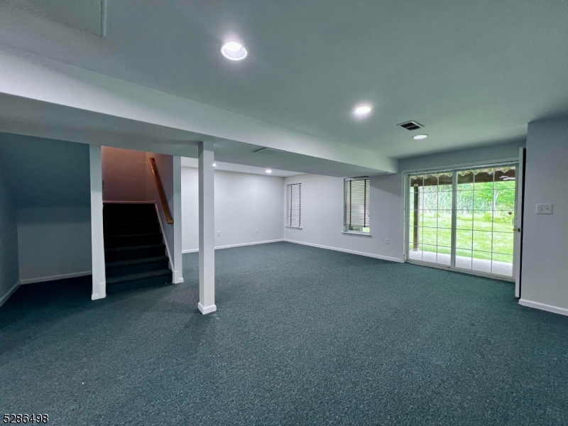 128 Constitution Way Bernards, NJ 07920 - Photo 18 of 26 an empty room with a empty space and window