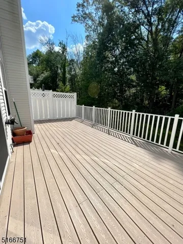 a view of backyard with deck