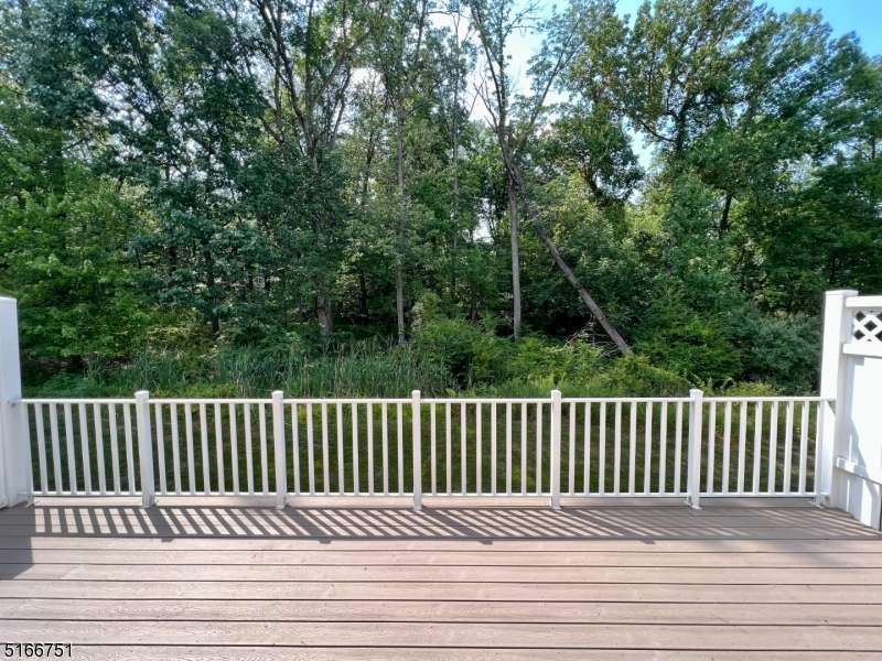 128 Constitution Way Bernards, NJ 07920 - Photo 21 of 26 a view of a wooden roof deck