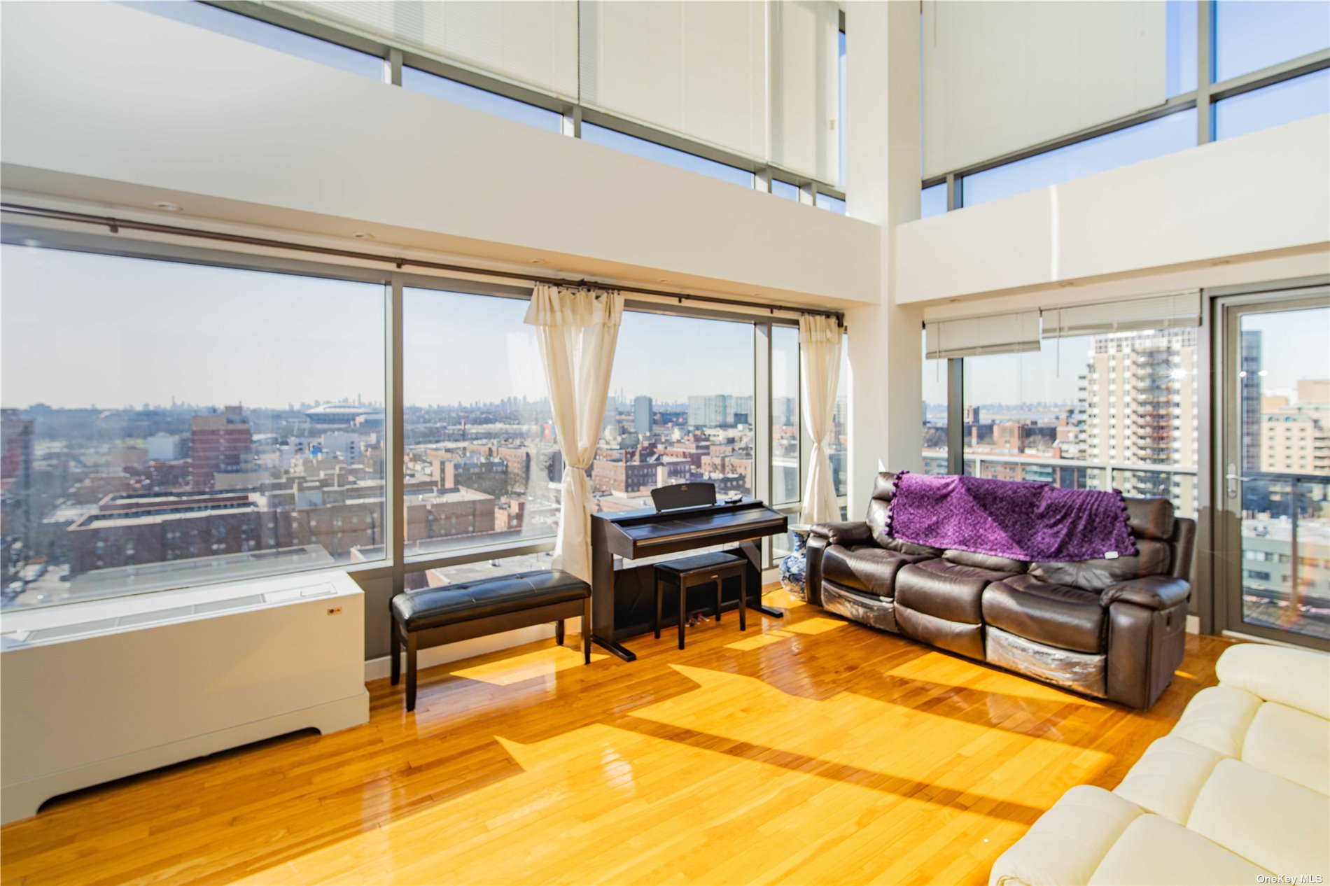 a living room with furniture city view