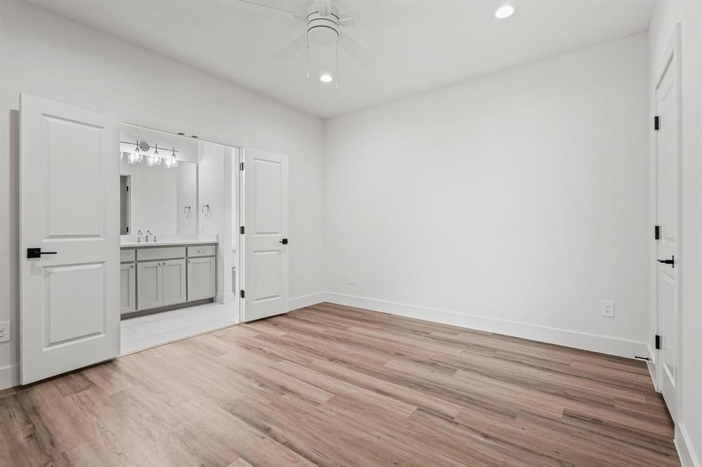 508 Florence Denison, TX 75020 - Photo 14 of 26 a view of empty room with wooden floor