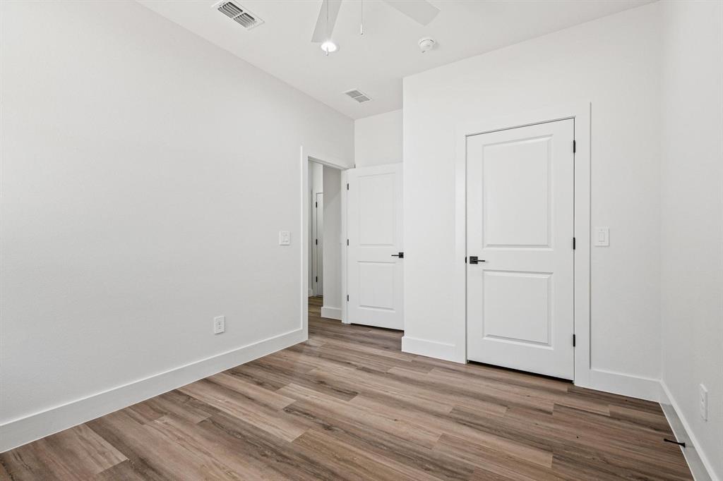 508 Florence Denison, TX 75020 - Photo 23 of 26 a view of a room with wooden floor and closet