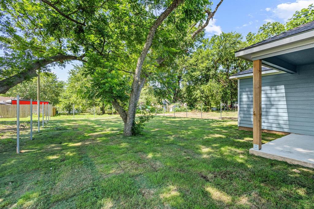 508 Florence Denison, TX 75020 - Photo 25 of 26 a view of a house with a backyard