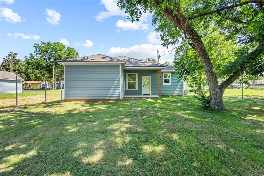 508 Florence Denison, TX 75020 - Photo 26 of 26 a house view with a garden space
