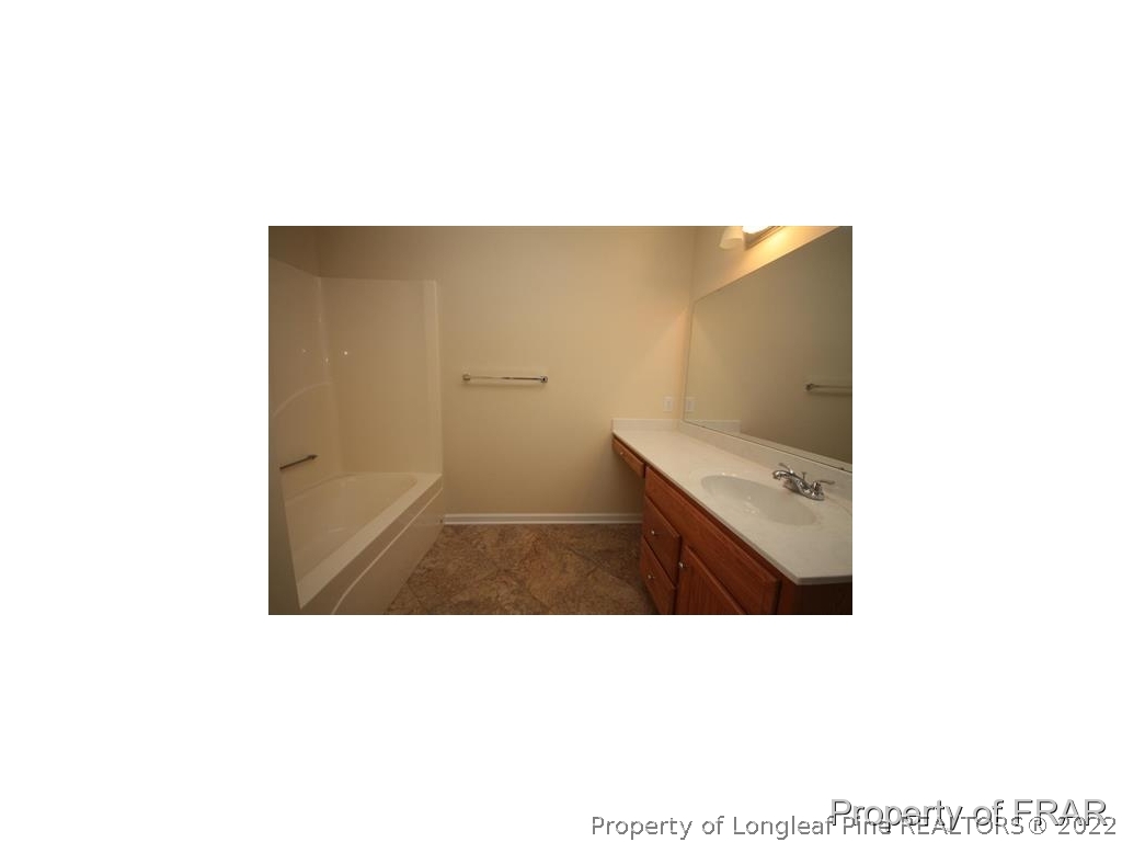 1373 Joel Road Carthage, NC 28327 - Photo 14 of 27 a open kitchen with a sink and cabinets