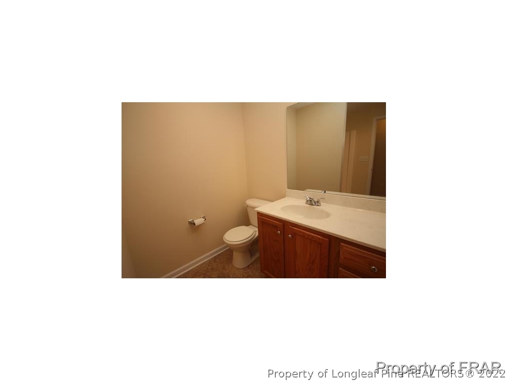1373 Joel Road Carthage, NC 28327 - Photo 19 of 27 a bathroom with a sink and a mirror