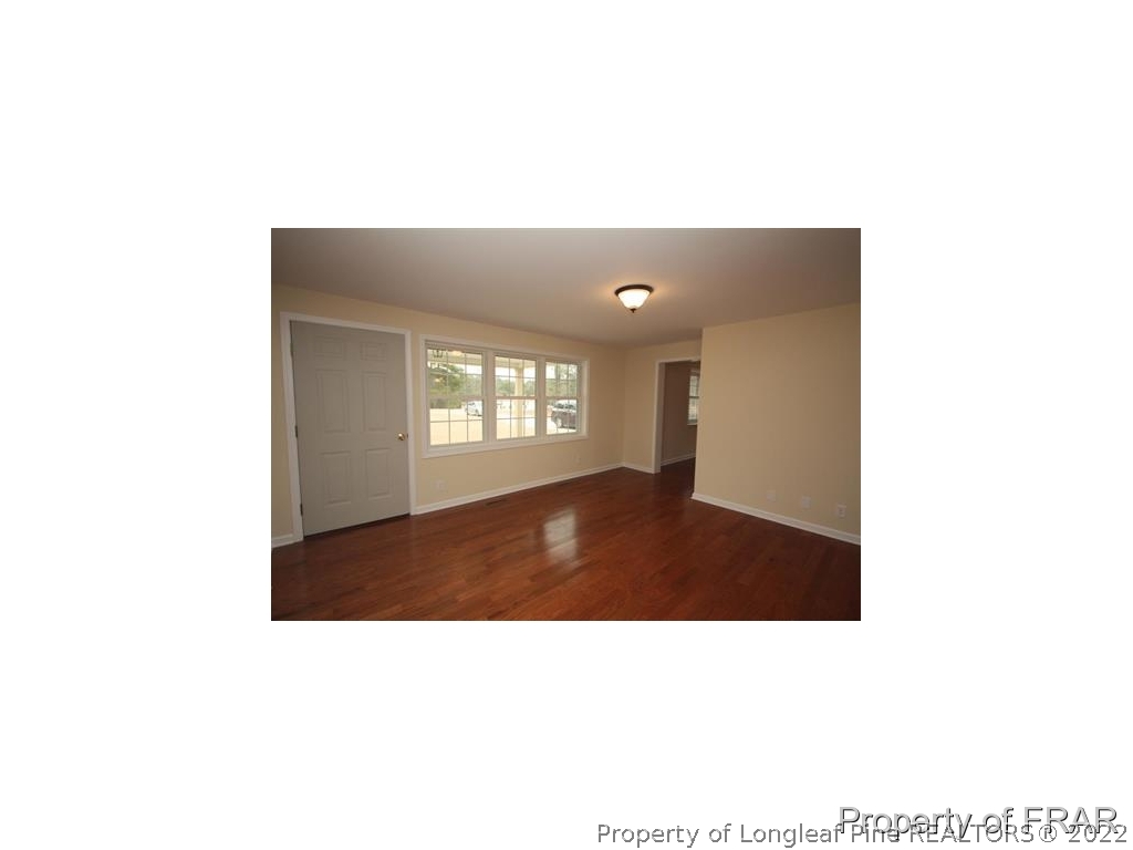 1373 Joel Road Carthage, NC 28327 - Photo 3 of 27 a black and white photo of a living room