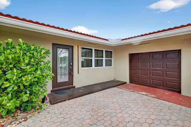 a view of the house with a garage