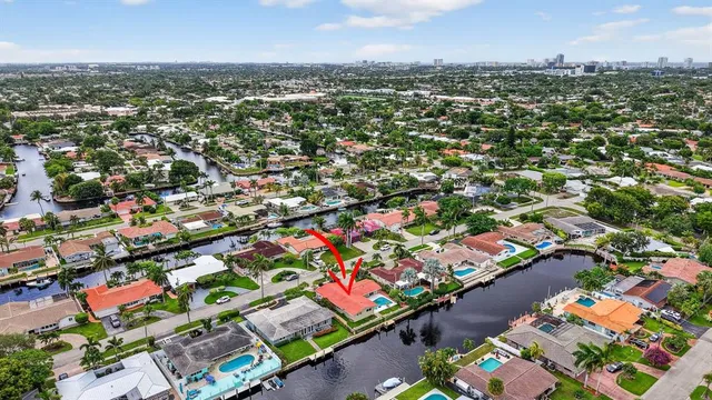an aerial view of city and lake