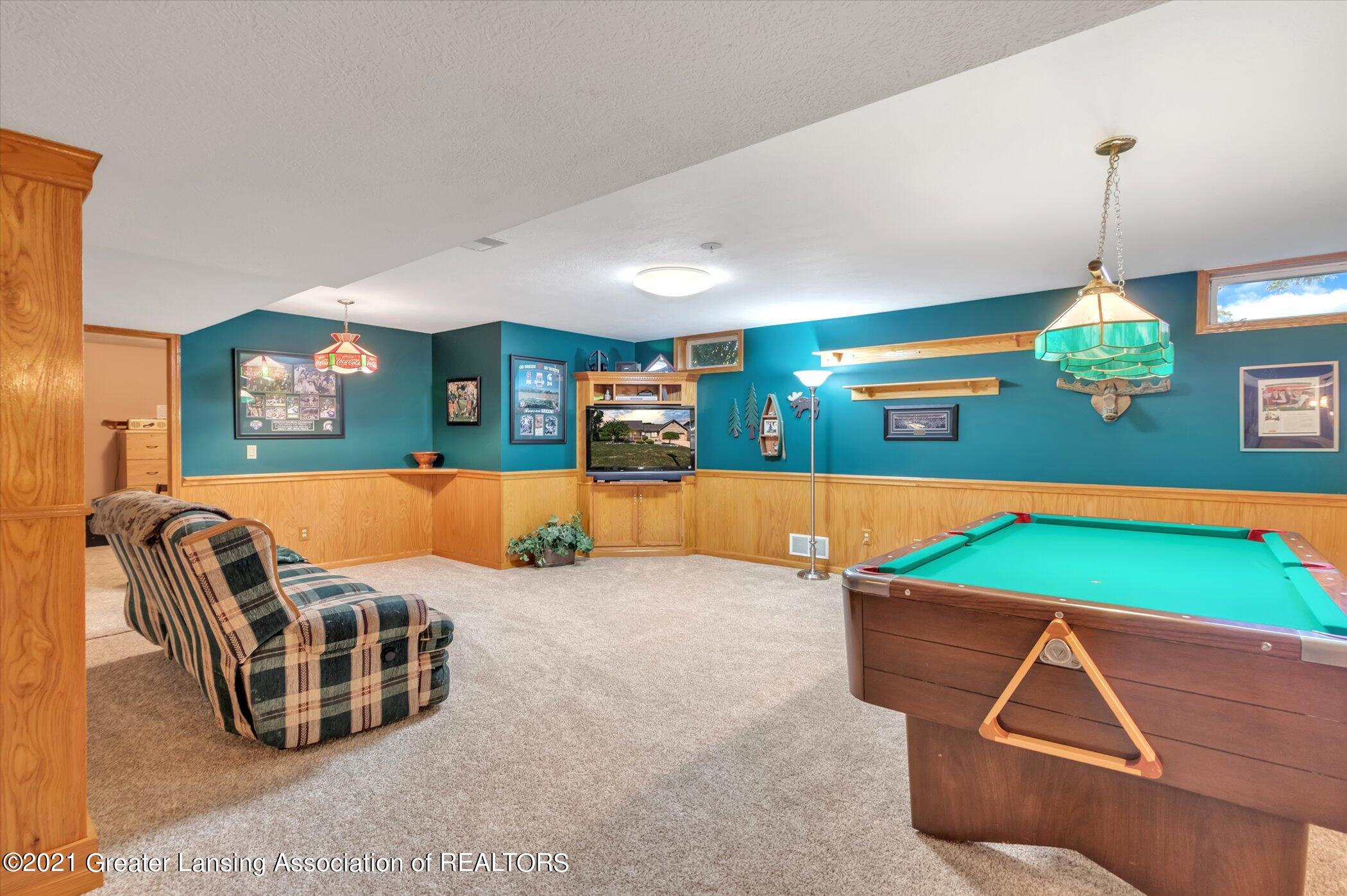 1515 Riley Ridge Drive Lansing, MI 48917 - Photo 33 of 38 33-1515-Riley-Ridge-Dr-WindowStill-Real-