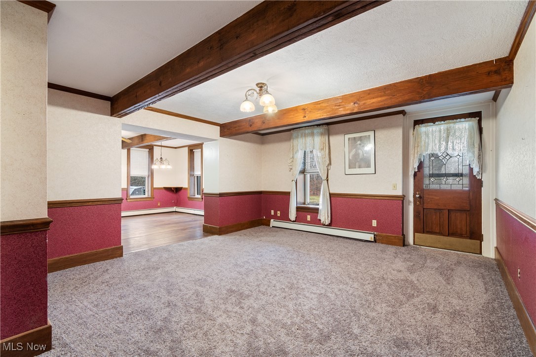 5147 Bluebird Road Northwest Malvern, OH 44644 - Photo 7 of 26 Entry way into living room area