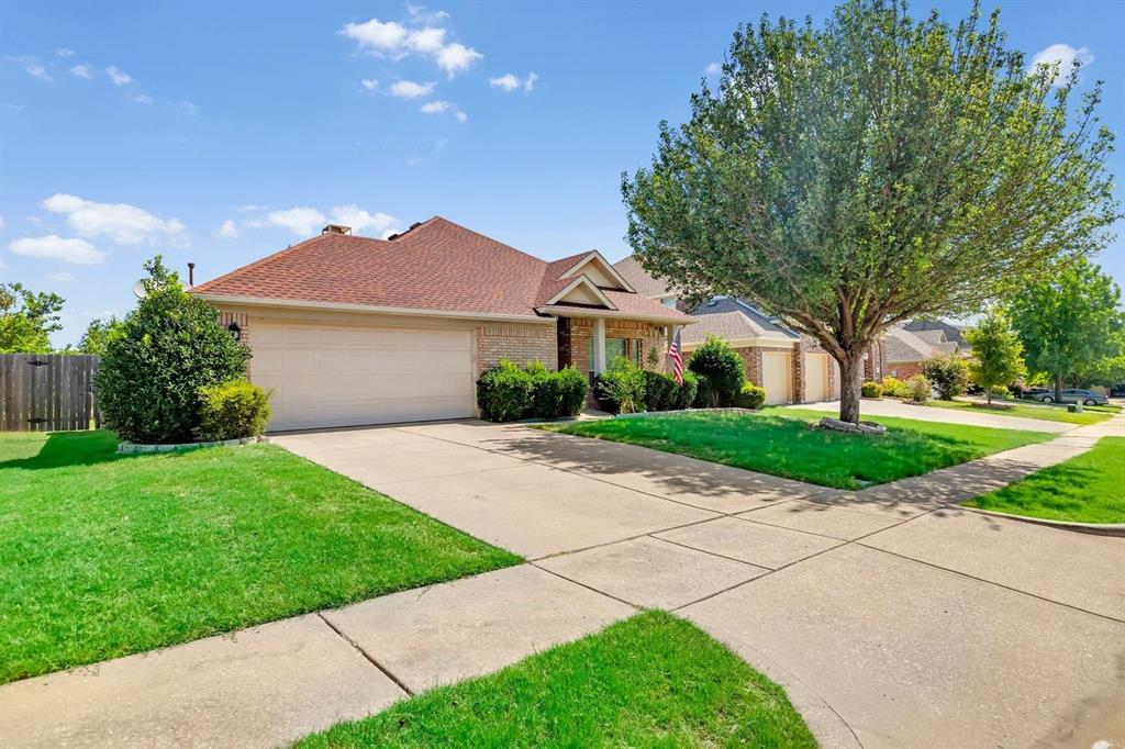 5316 Ridgeson Drive McKinney, TX 75071 - Photo 7 of 33 Brick exterior with an attached two-car garage