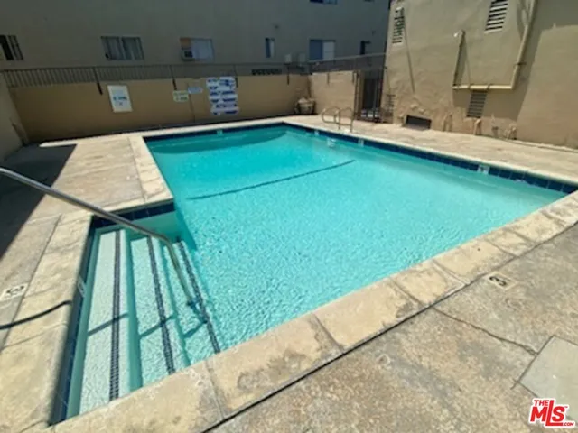 a view of outdoor space with a kitchen