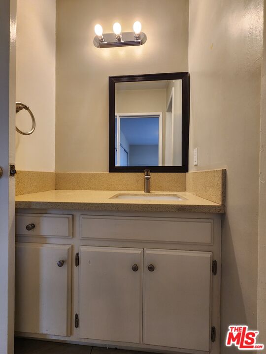 7925 Vineland Avenue, Unit 26 Los Angeles, CA 91352 - Photo 17 of 34 a bathroom with a sink and a mirror