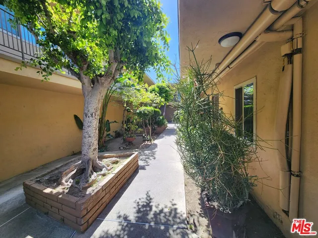 a view of entryway with wooden stairs