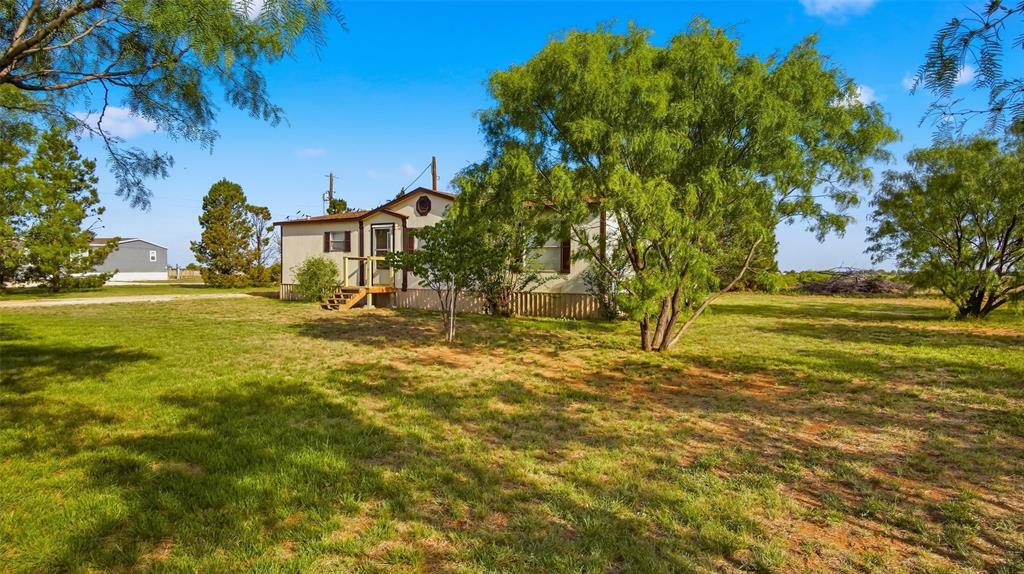 10902 County Road 414 Merkel, TX 79536 - Photo 2 of 26 a view of a yard with an trees