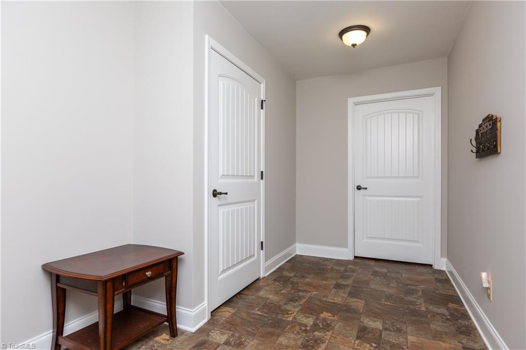 3713 Pride's Road East Bend, NC 27018 - Photo 18 of 29 Entrance from garage with oversized storage closet