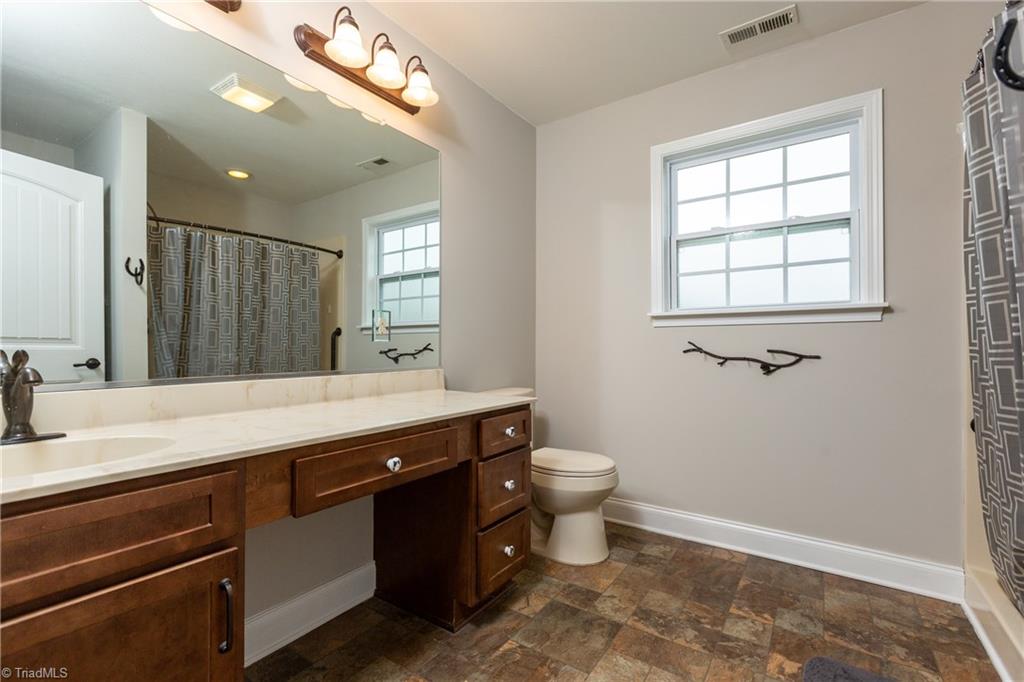 3713 Pride's Road East Bend, NC 27018 - Photo 21 of 29 Hall bath for secondary bedrooms