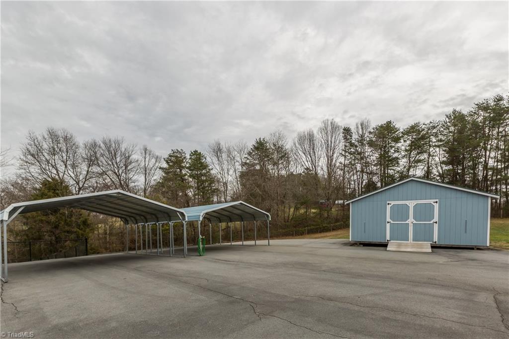 3713 Pride's Road East Bend, NC 27018 - Photo 25 of 29 Plenty of storage for the boat, the trailer, and the car collection!