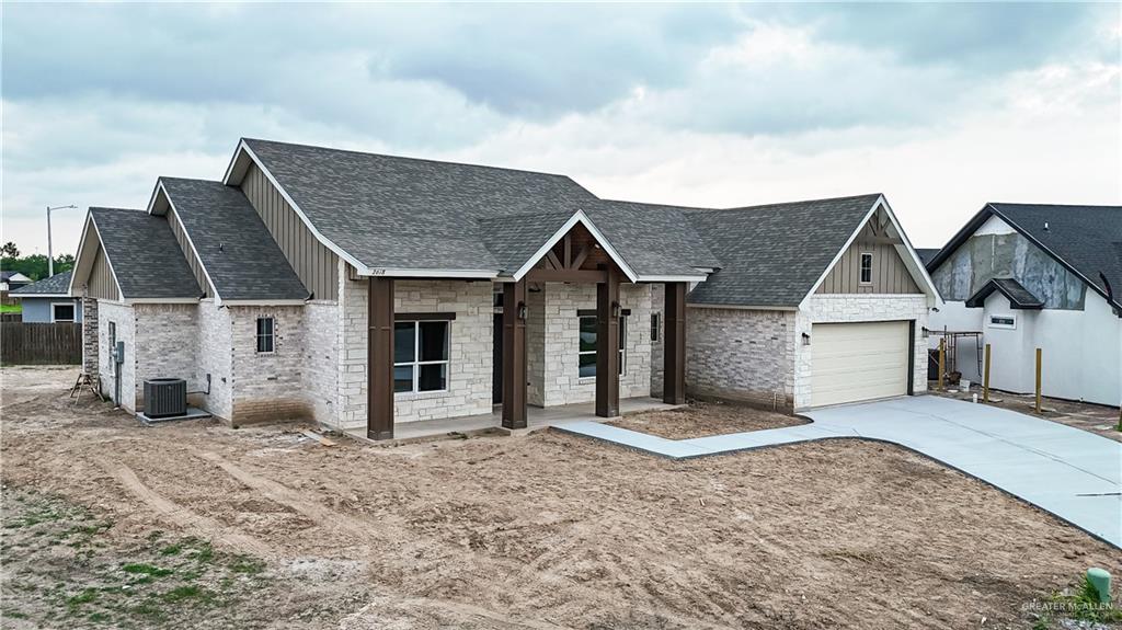 2618 Max Street Harlingen, TX 78552 - Photo 2 of 35 Contemporary residence featuring a light-colored brick exterior with dark trim accents