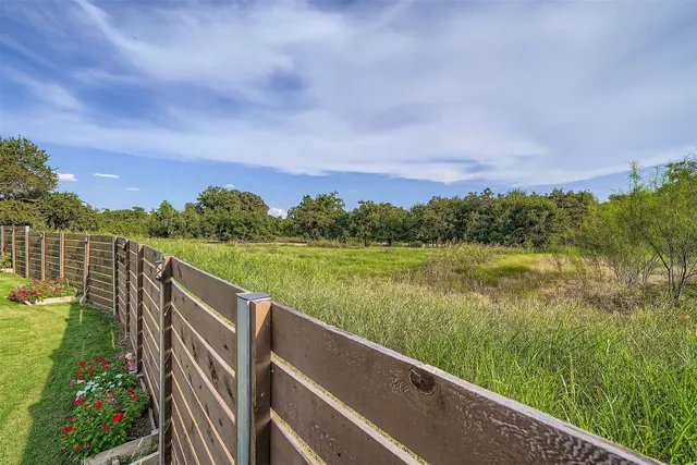 a view of a lake with a garden