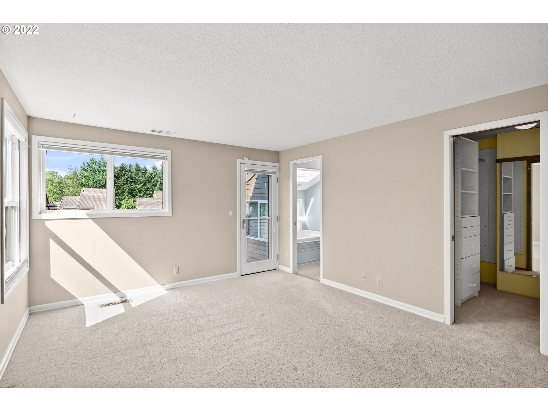 7870 Southwest Raintree Drive Beaverton, OR 97008 - Photo 14 of 26 Owner's Suite Bedroom