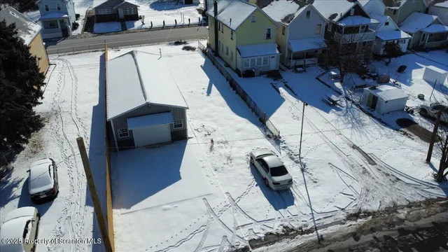a view of building with yard