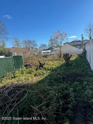 a view of a yard with an outdoor space