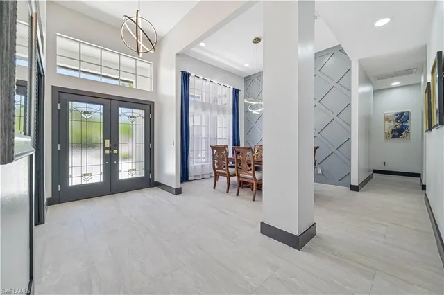 a view of a livingroom with furniture and windows
