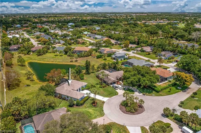 an aerial view of a house with a garden