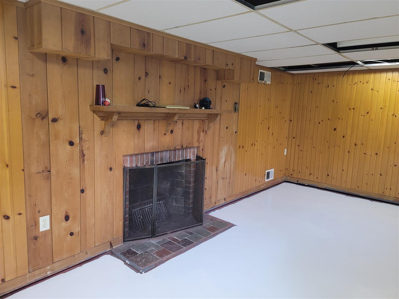 416 South State Road Davison, MI 48423 - Photo 14 of 23 Basement Fireplace