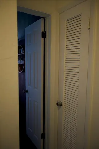 a bathroom with a glass door