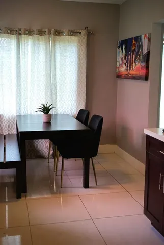 a workspace with furniture and a window