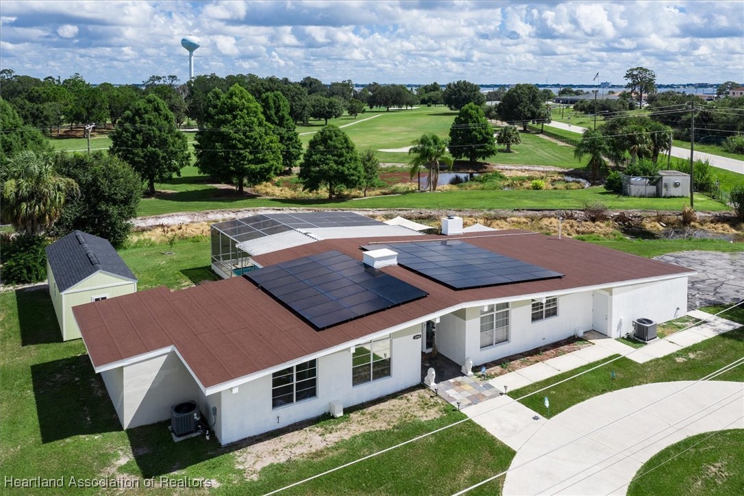 3200 Golfview Road Sebring, FL 33875 - Photo 3 of 49 an aerial view of a house with a yard