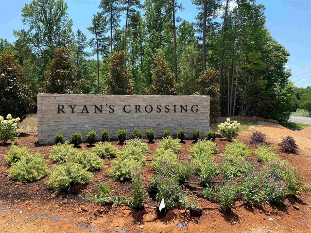 a picture of a bathroom with a sink and a mirror