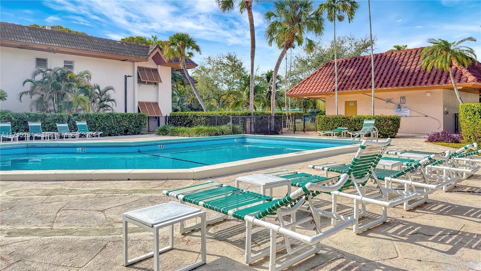 9302 Southwest 77th Avenue, Unit B1 Miami, FL 33156 - Photo 14 of 17 a front view of a house with garden