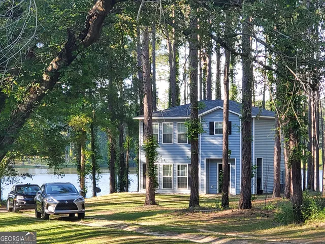 a view of a city with palm trees