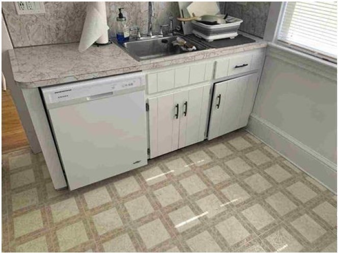 28 Beaconsfield Road, Unit 1 Brookline, MA 02445 - Photo 11 of 21 a kitchen with white cabinets