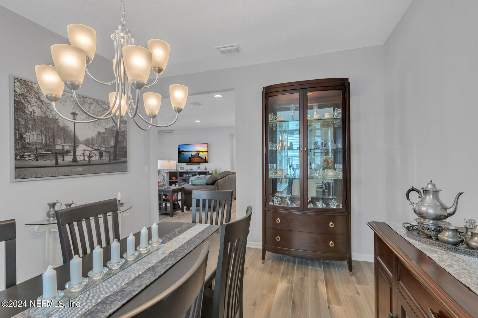 126 Firefly Trace St. Augustine, FL 32092 - Photo 18 of 54 a view of a hallway to dining room and wooden floor