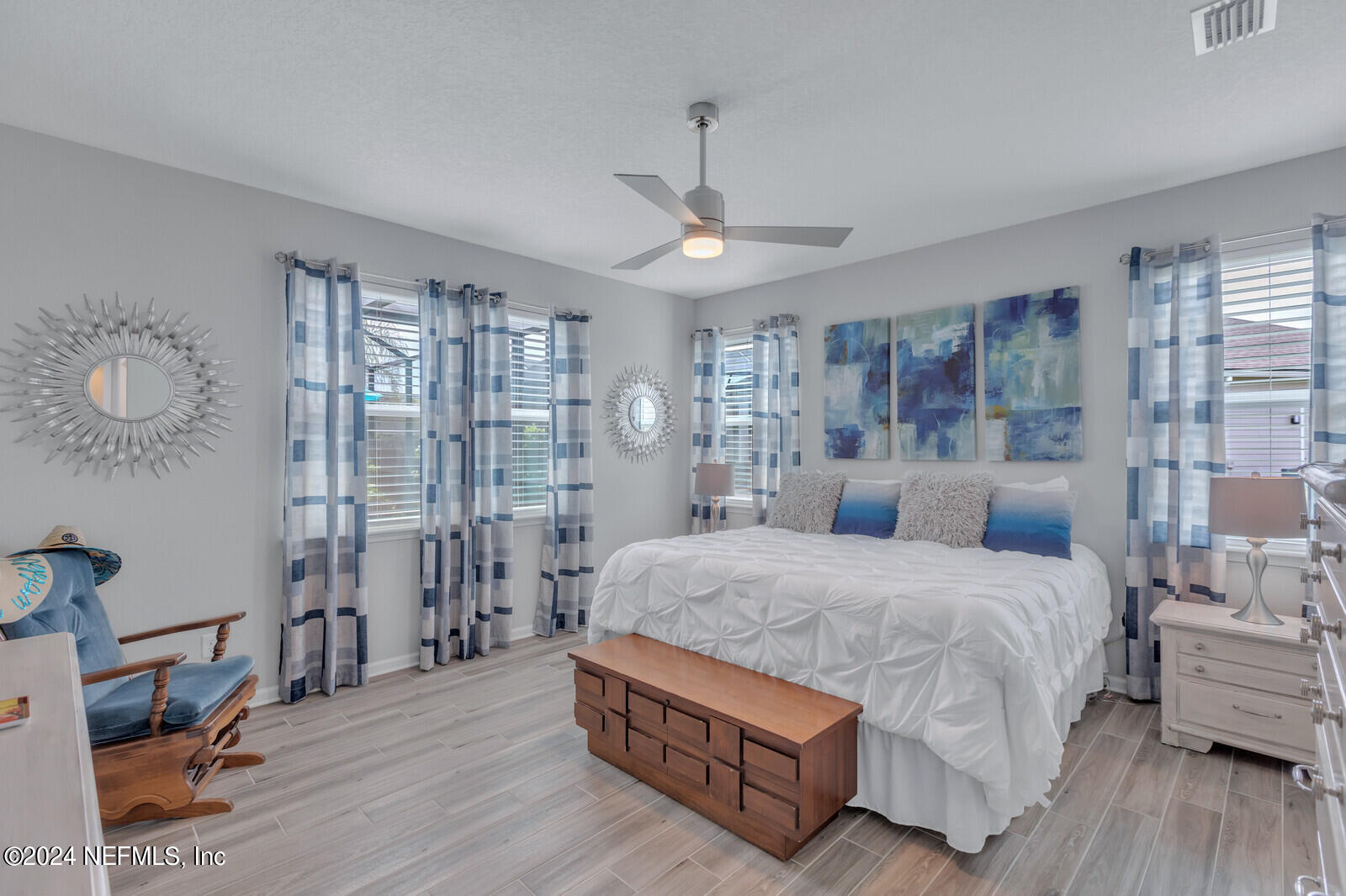 126 Firefly Trace St. Augustine, FL 32092 - Photo 20 of 54 a bedroom with a bed wooden floor and window