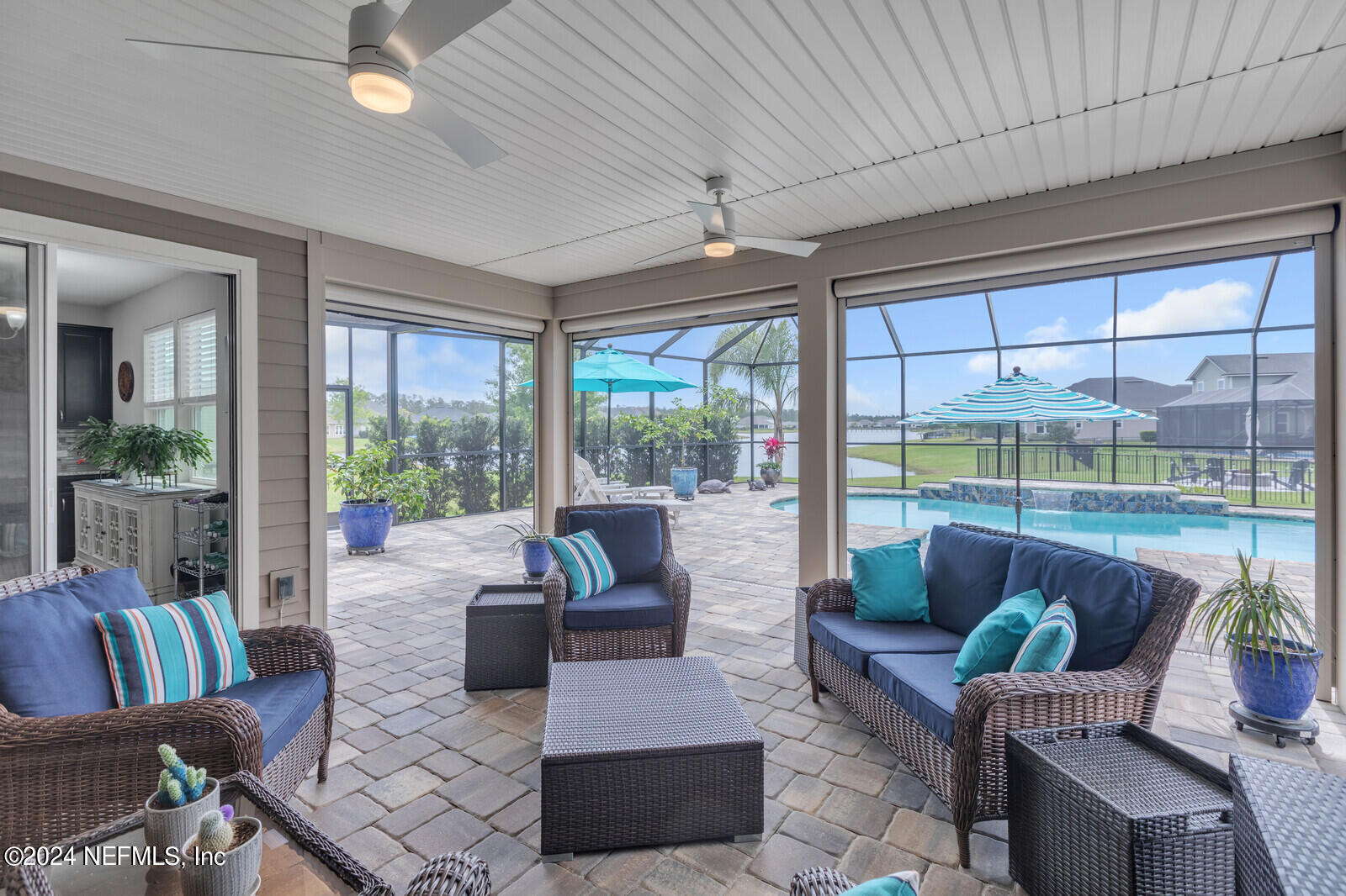 126 Firefly Trace St. Augustine, FL 32092 - Photo 2 of 54 a living room with furniture and a large window
