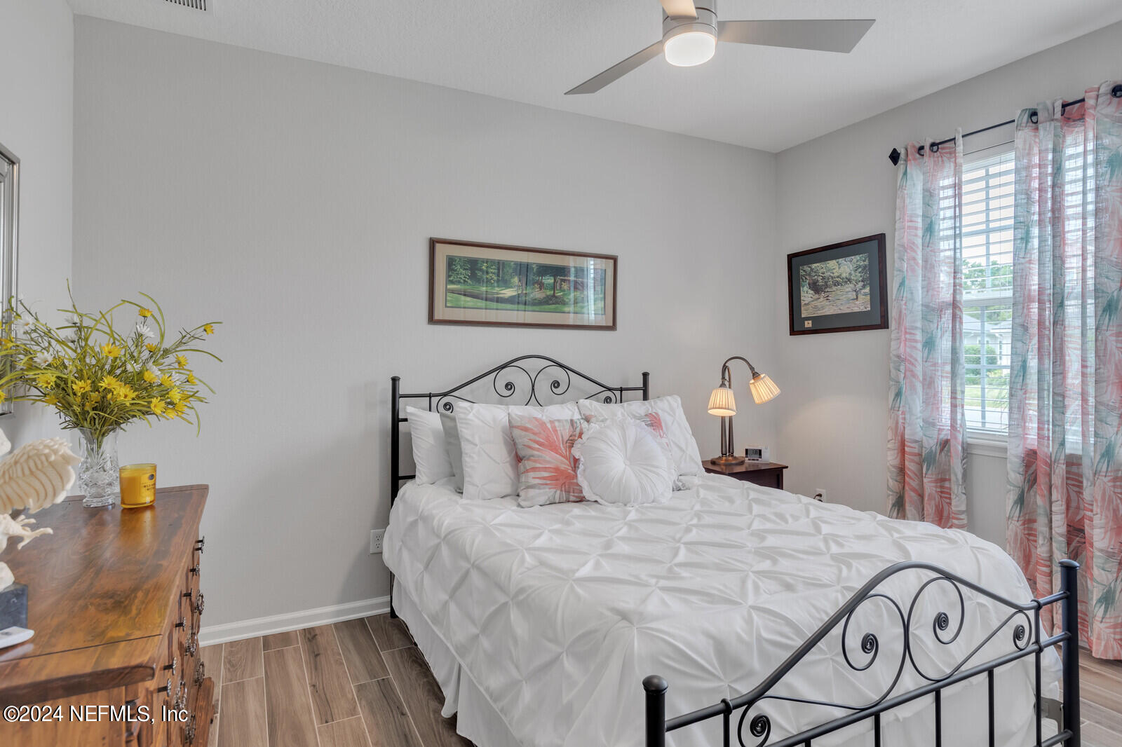 126 Firefly Trace St. Augustine, FL 32092 - Photo 23 of 54 a bedroom with a bed and a window