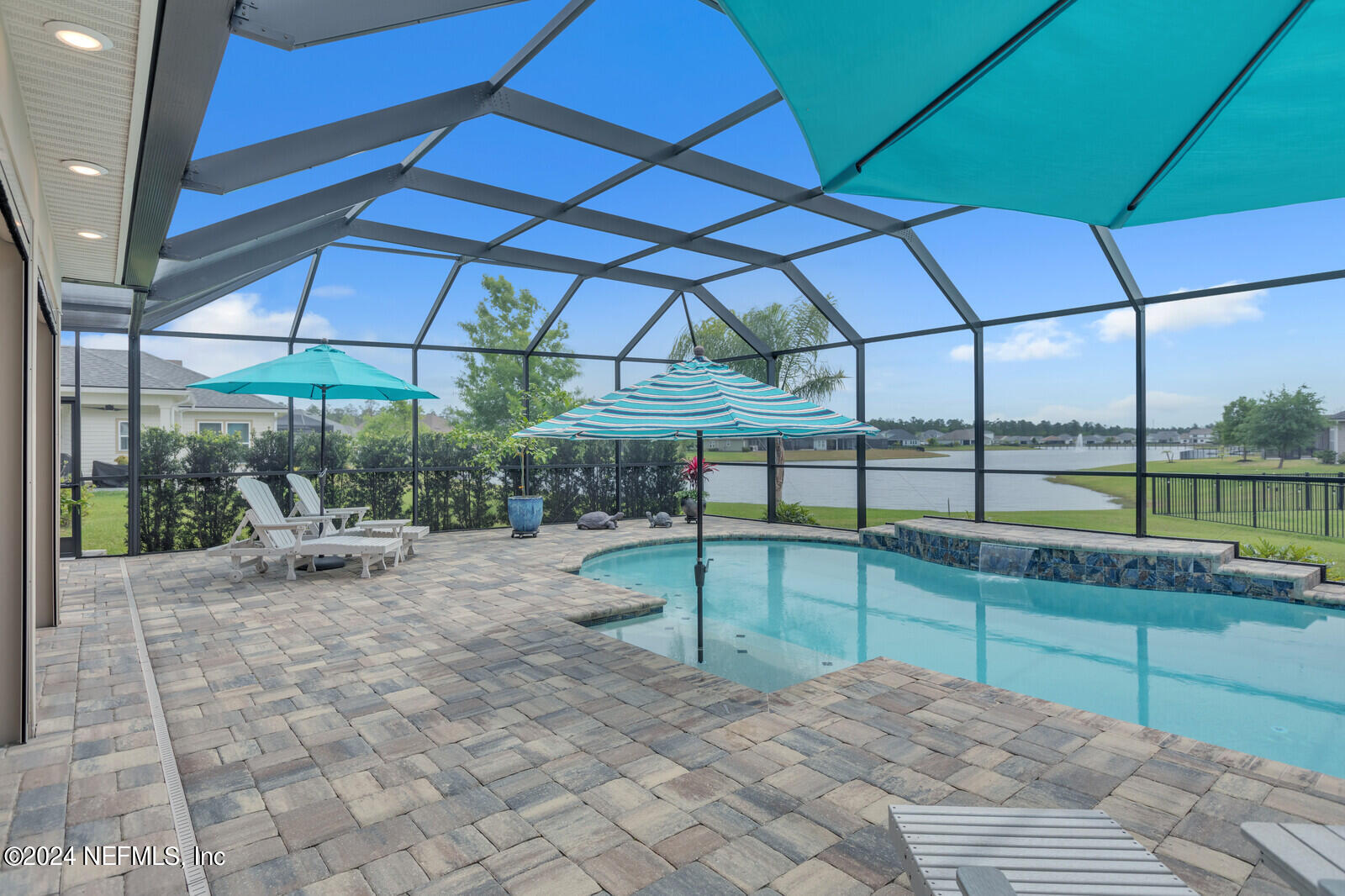 126 Firefly Trace St. Augustine, FL 32092 - Photo 37 of 54 a view of a backyard with sitting area
