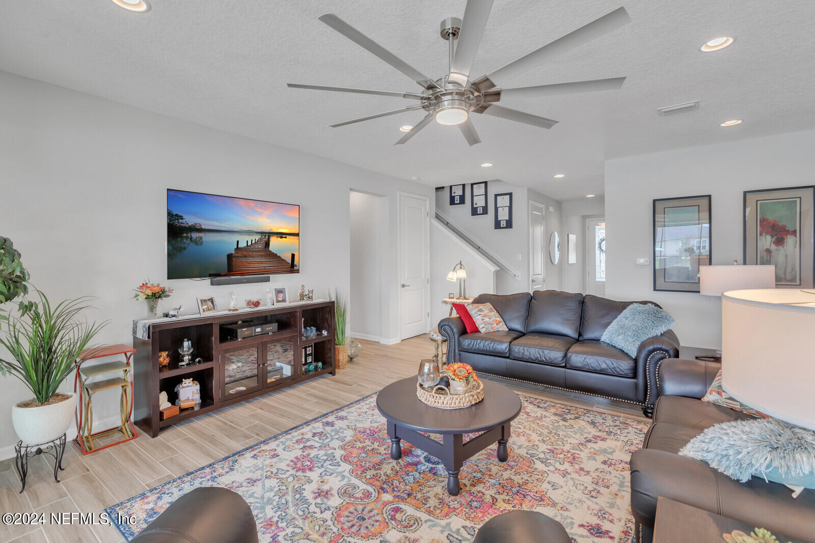 126 Firefly Trace St. Augustine, FL 32092 - Photo 9 of 54 a living room with furniture and wooden floor