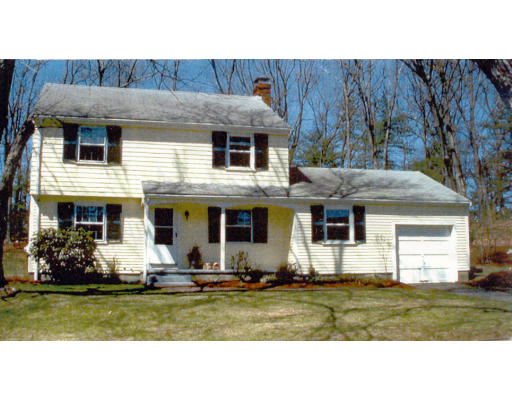 238 Concord Road Wayland, MA 01778 - Photo 1 of 1 a view of a white house with a yard and a fountain